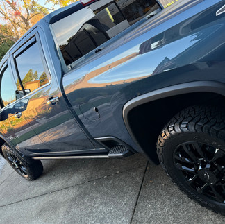Back-Side View of Coated New Chevy Silverado in Napa looking glossy outside customer’s garage by Robust Paint Protection & Auto Detailing
