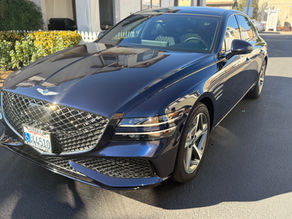 Front side view of wrapped and coated Genesis GV80 in Fairfield, California