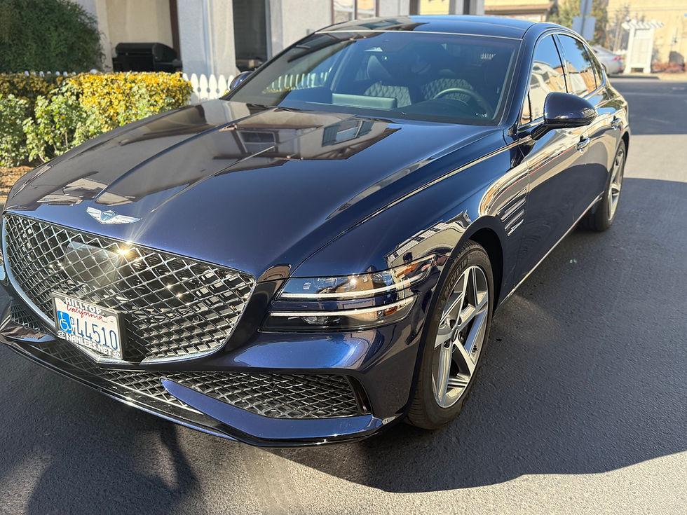 Front side view of wrapped and coated Genesis GV80 in Fairfield, California