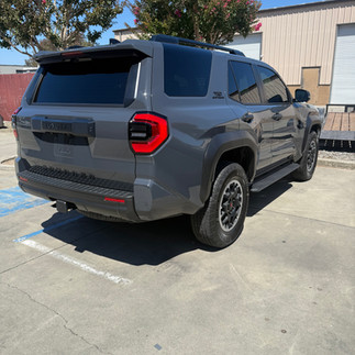 Passenge side rear view of Ceramic Paint Protection Film (PPF) and Ceramic Coating on Toyota 4Runner showing coating and hatch with PPF on