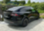 Black Tesla Model Y in Napa California after a matte vinyl wrap removal