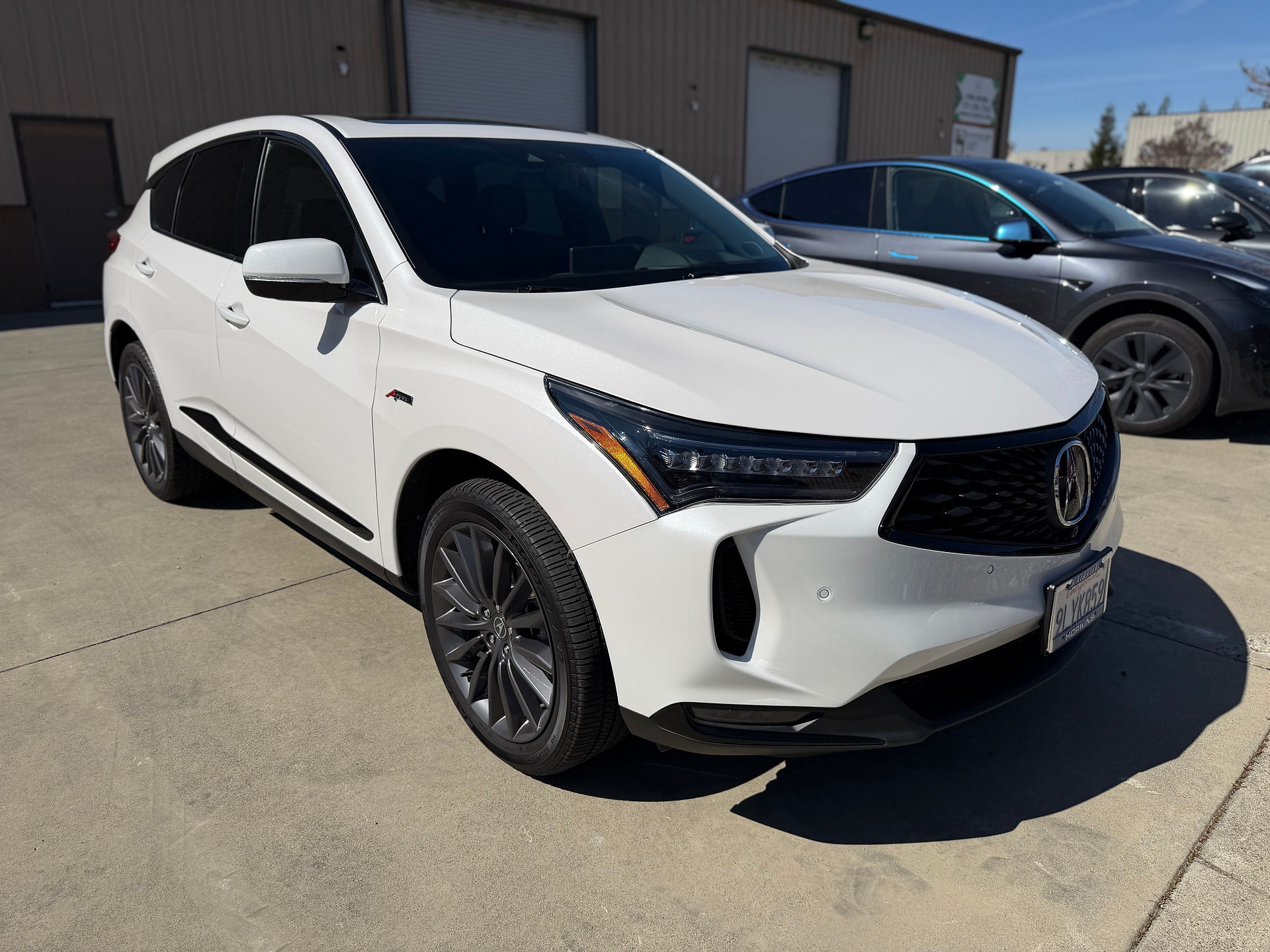 Front passenger side view of Acura RDX after ppf install full front