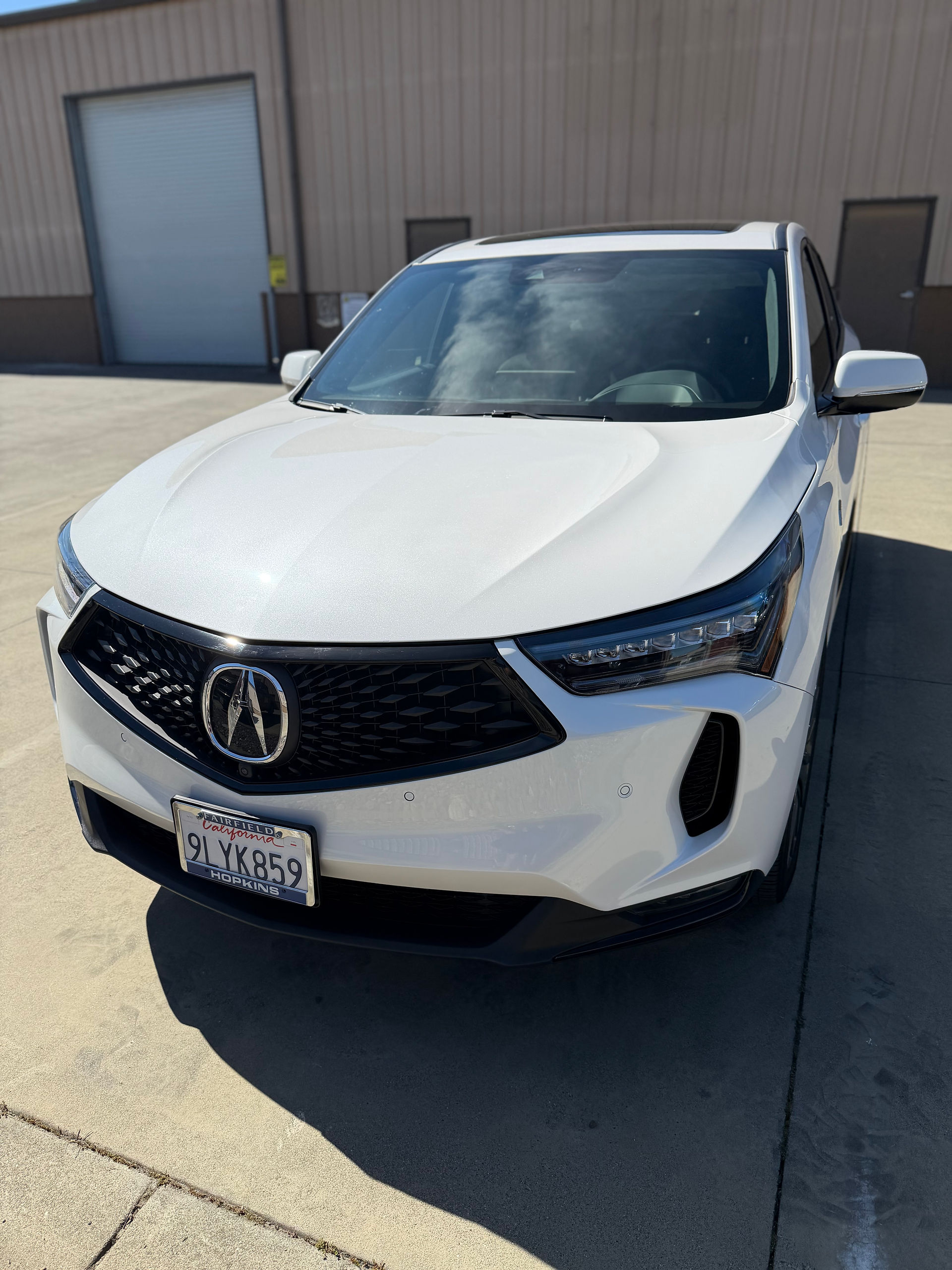 Driver side front view of Acura RDX white after PPF wrap in Napa