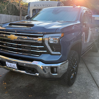 Front View of Coated New Chevy Silverado in Napa by Robust Paint Protection & Auto Detailing outside a garage