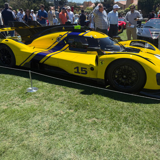 Ferrari at Casa Ferrari detailed at Pebble Beach by Robust Paint Protection & Auto Detailing Yellow