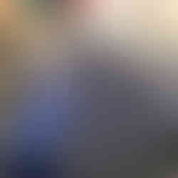 Blue metallic hood of M4 BMW Competition with 10-year graphene coating inside customer’s garage