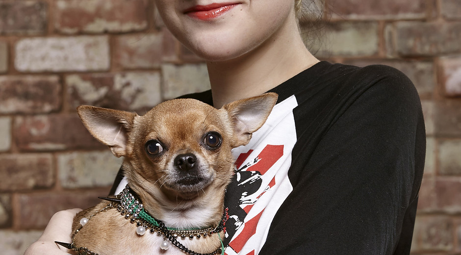 Woman Holding a Dog