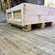 Open-frame wood shipping base on skids