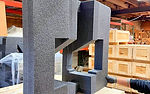 Charcoal foam insert for interior crate packaging, shown in the McConnell shop