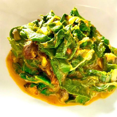 Spinat mit einer Curry Tomaten Salsa