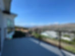 High angle view of a newly installed vinyl deck with glass railings