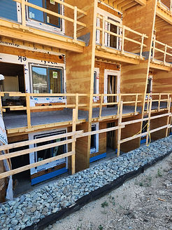 Commercial condo building railimgs aluminum gass railings picket railings vinyl decking british columbia BC Housing first nation kelowna canada okanagan kamloops merrit 