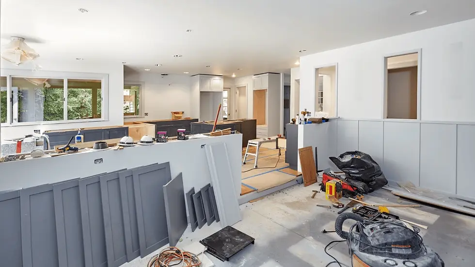 Professional kitchen remodeling in Victoria, Texas with gray cabinet panels and recessed lighting installation