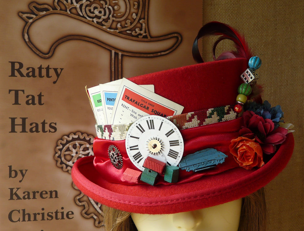 Thumbnail: Lady's red Monopoly inspired Deadman or low crown top hat with vintage edition game parts. Trafalgar Square by Ratty Tat Hats
