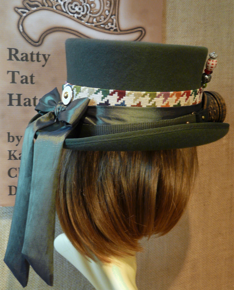 Thumbnail: Lady's olive green Steampunk top hat with goggles