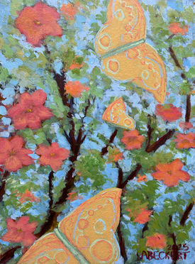 Yellow butterflies near pale orange flowering branches