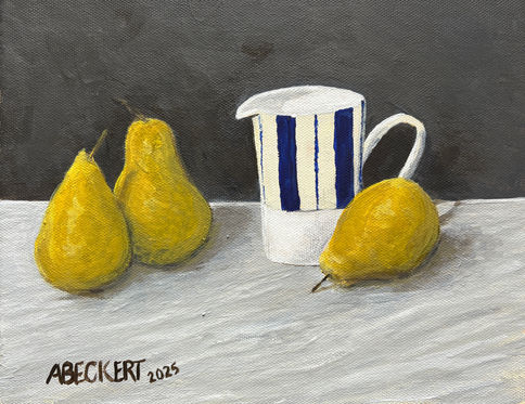 Three pears and a striped ceramic pitcher on a table.