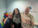 Manager of Aurora Home Care with two service users smiling together