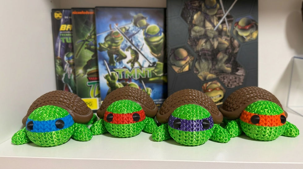 Thumbnail: Knitted Nina Turtle Figure – 3D Printed Desk Companion