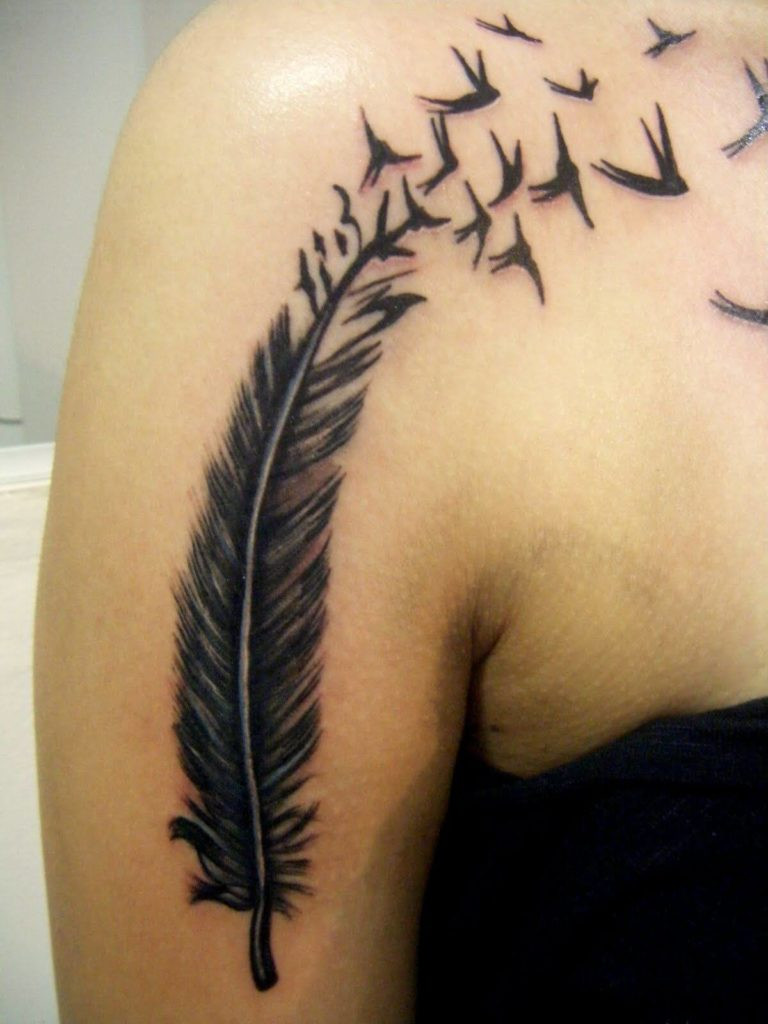 feather with birds flying tattoo on arm