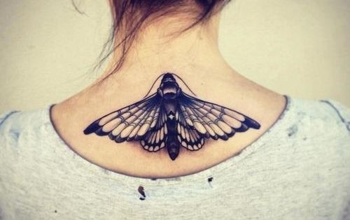 moth tattoo on back