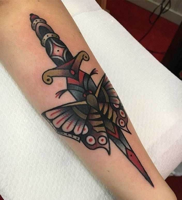 colourful dagger and moth tattoo