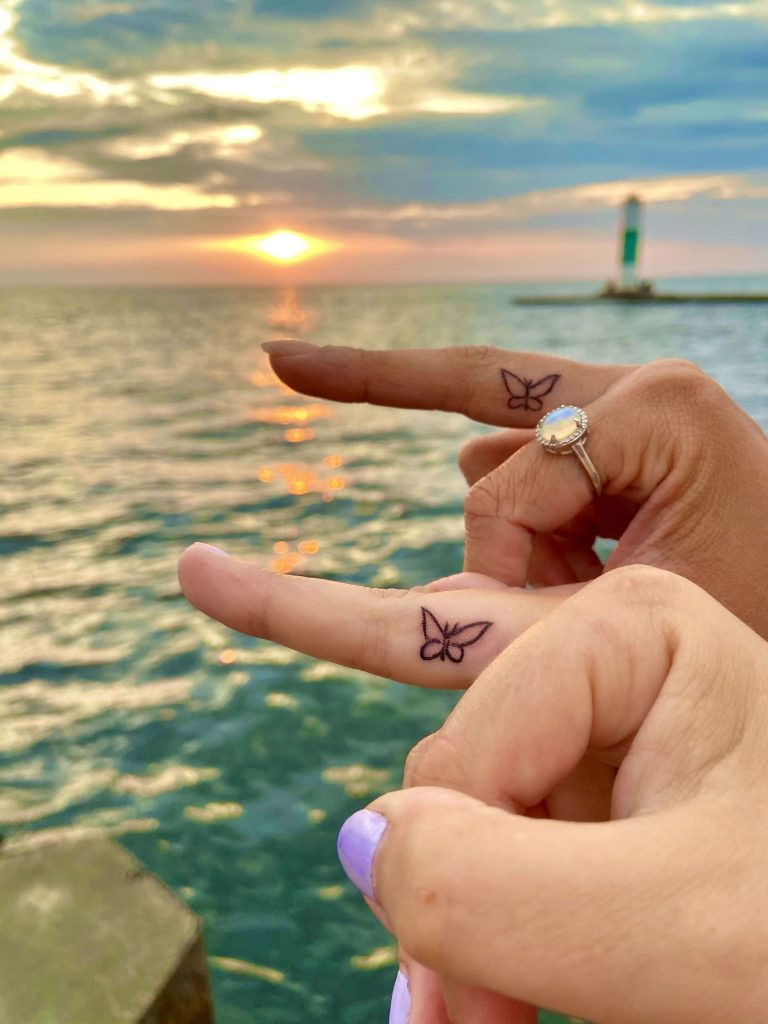 Best friend tattoos on finger