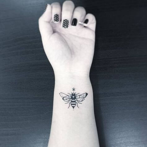 bee tattoo on arm