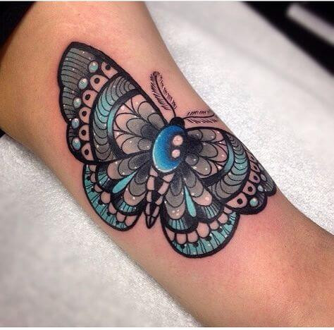 moth tattoo on hand