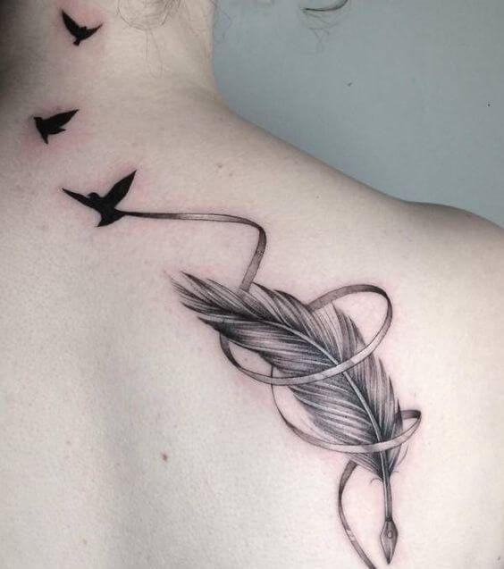 feather with bird tattoo on back
