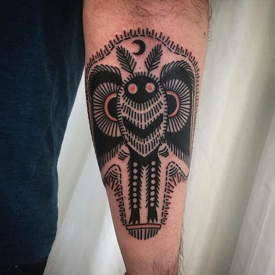 mothman tattoo on hand