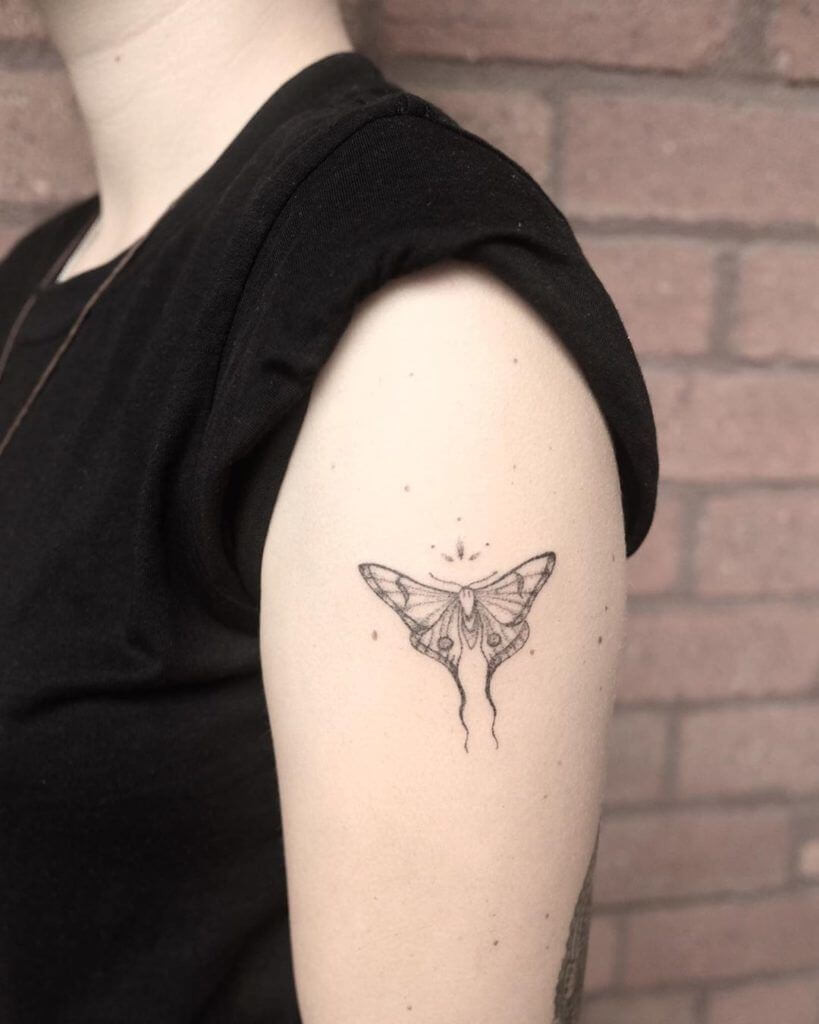 minimalist moth tattoo