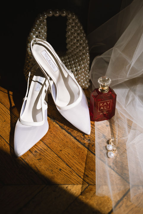 Destination wedding at Château de Santeny in the Val-de-Marne, near Paris. The bride is wearing a Made with Love Bridal wedding dress. Wedding photographer Charlotte Gamus, founder of La Loverie, brings a fresh perspective to modern weddings. Her images are candid, vibrant and full of life, capturing genuine moments with a documentary approach while breaking away from traditional wedding photography. La Loverie photographs unconventional couples who prefer to create their own rules rather than follow traditions. A documentary style with an editorial edge.