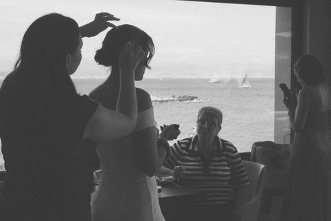 A wedding at Cap d'Antibes, at the Maison de Bacon. Here, the bride wears a dress by House of St. Patrick. Photographer Charlotte Gamus brings a fresh perspective to weddings with La Loverie. Her images are vibrant, mostly candid and natural, and playful, breaking with traditional conventions. La Loverie photographs unconventional couples who want to create their own unique style. La Loverie is defined by its documentary-style wedding photography with an editorial touch.