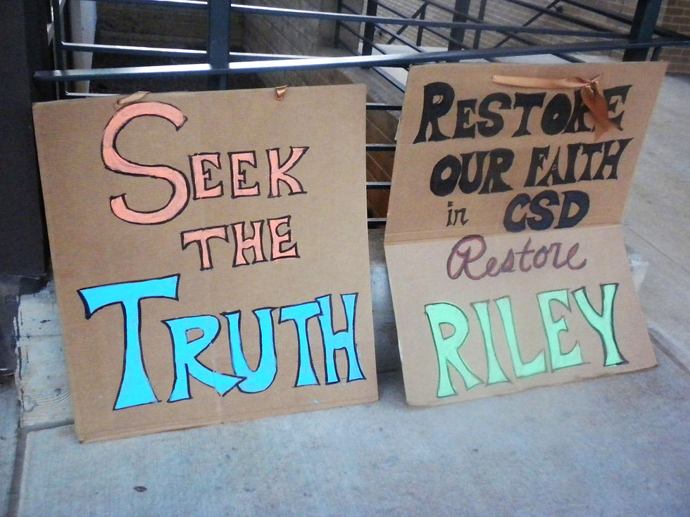 Signs at the March CSD Meeting