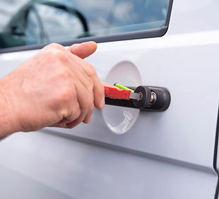 Locksmith opening a locked car door.jpg