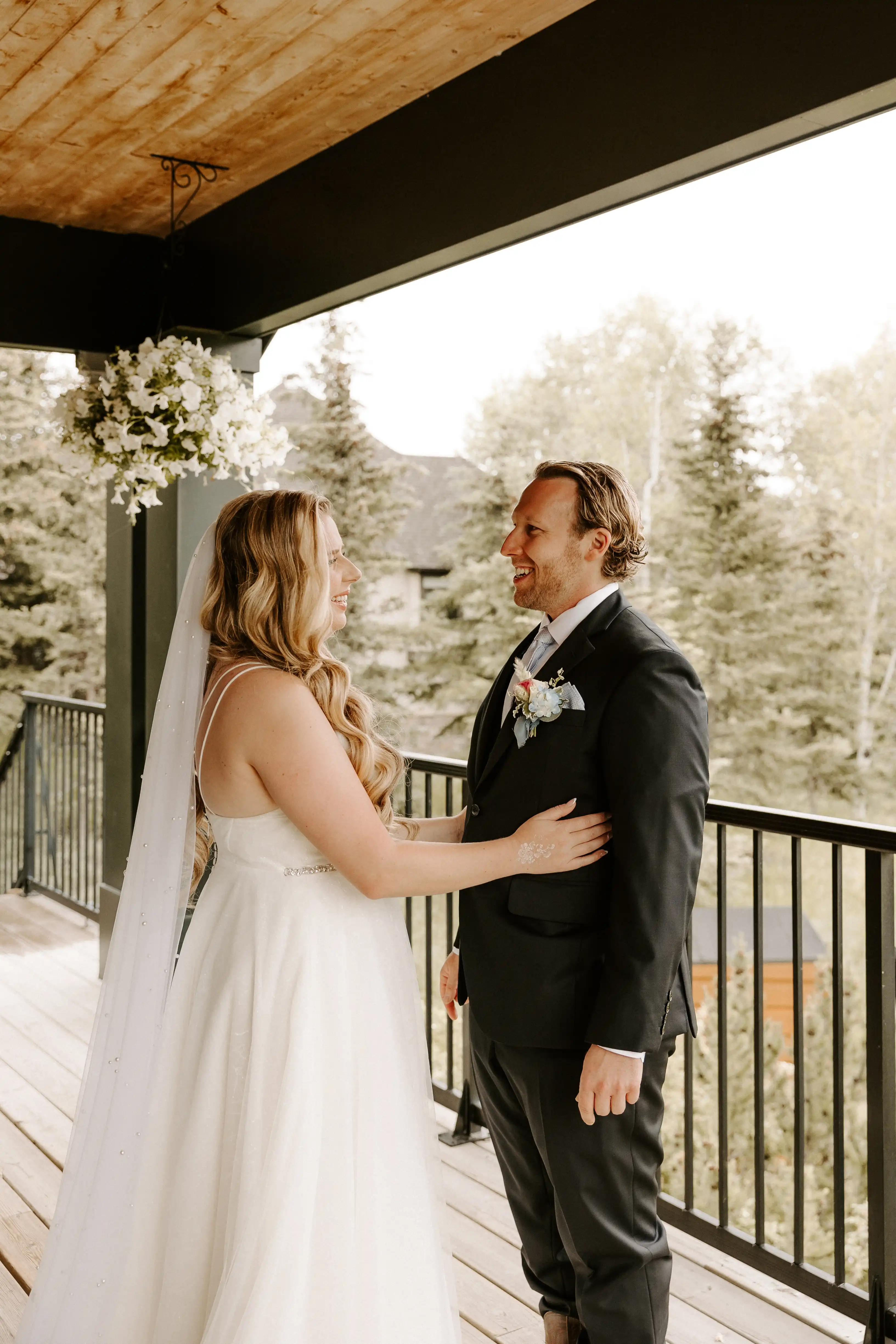 Bride and groom gazing into each other’s eyes.