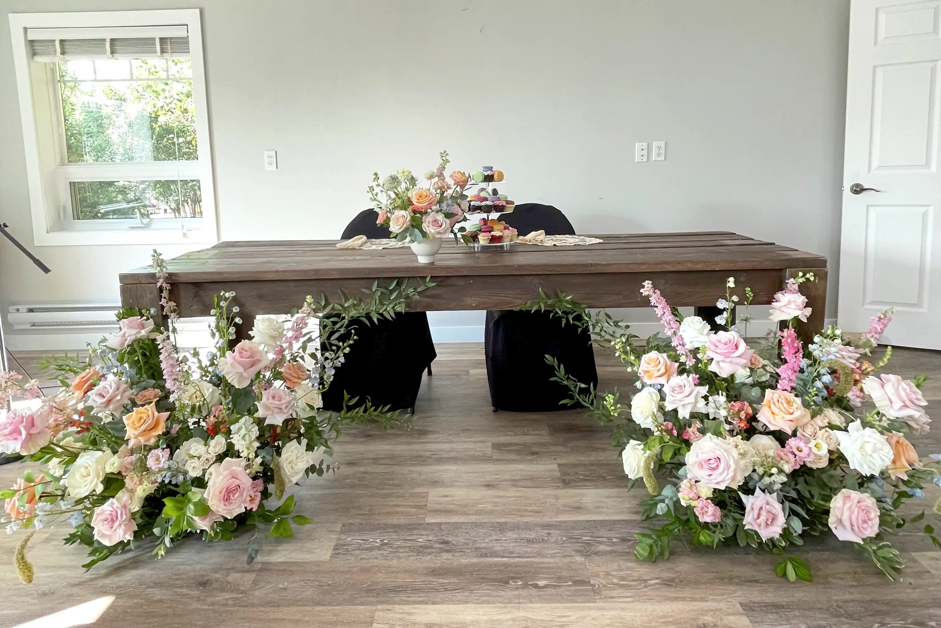 Main table adorned with beautiful flowers.