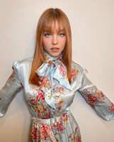 Orange hair with wispy bangs