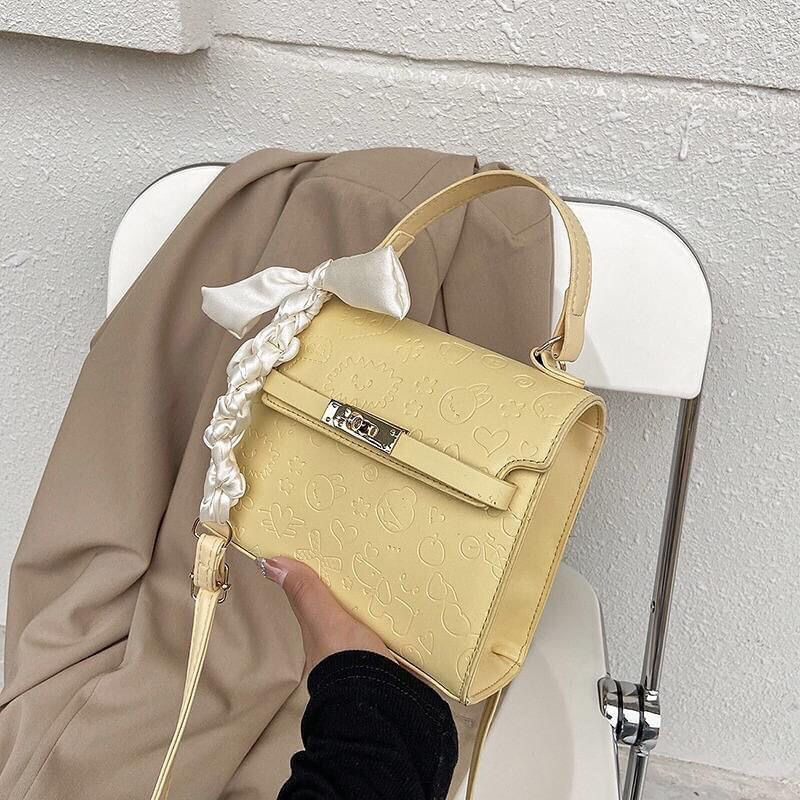 Hình thu nhỏ: Túi xách da hoạ tiết chìm size to 19x16 (kèm khăn buộc)