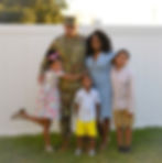 picture of Ulisses Bautista, the author of this post, in his military uniform with his wife Marla and their 3 kids