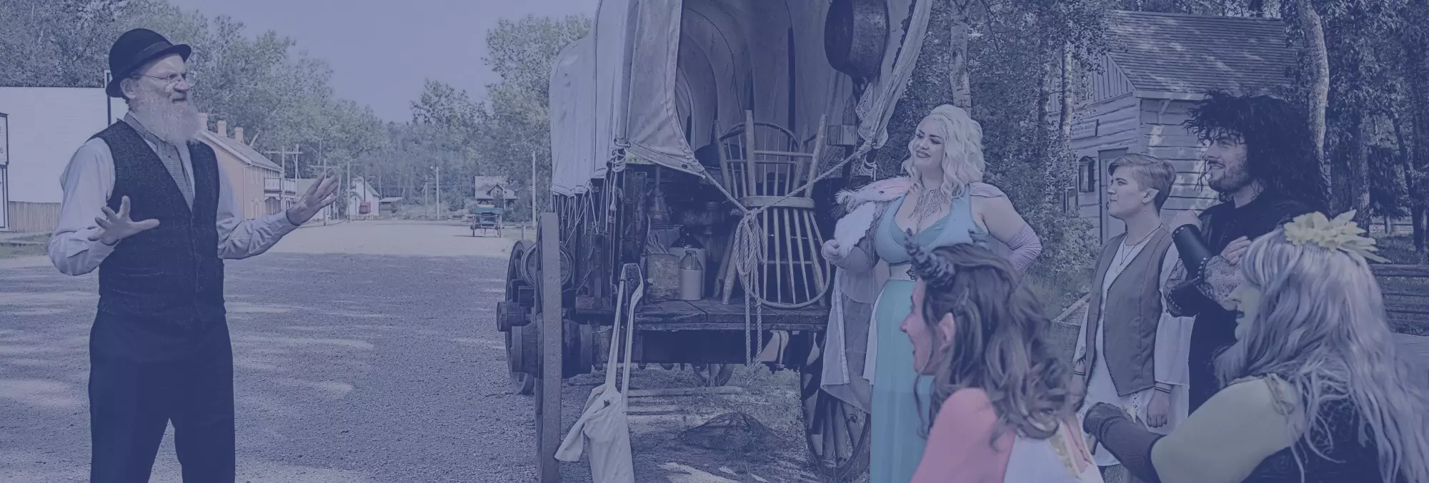 A group of adventurers listen to a bard tell a story.