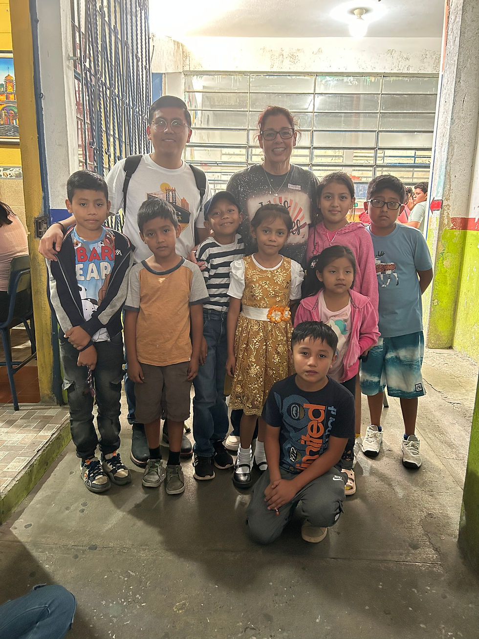 Translator Nelson & Nurse Tracy with Children Who Visited the Medical Clinic -- RIM Guatemala 2025