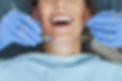 male-dentist-and-woman-in-dentist-office-2023-11-27-05-11-15-utc.jpg