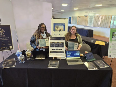 Jessica Renslow and Gretchen Sipp exhibiting for NSI at the APA IN conference.