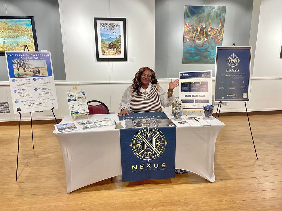 (ID: Gretchen Sipp mans the NSI table at the event.)