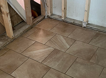 Restored tile floor after deep cleaning and disinfecting by Suds Up Carpet Cleaning following hurricane flooding in Pasco County Florida.