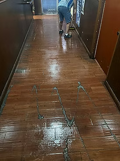 Tile floor before professional cleaning at Kickin Wingz restaurant in Hudson Florida.
