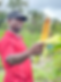 Farmer holding Corn 1.heic