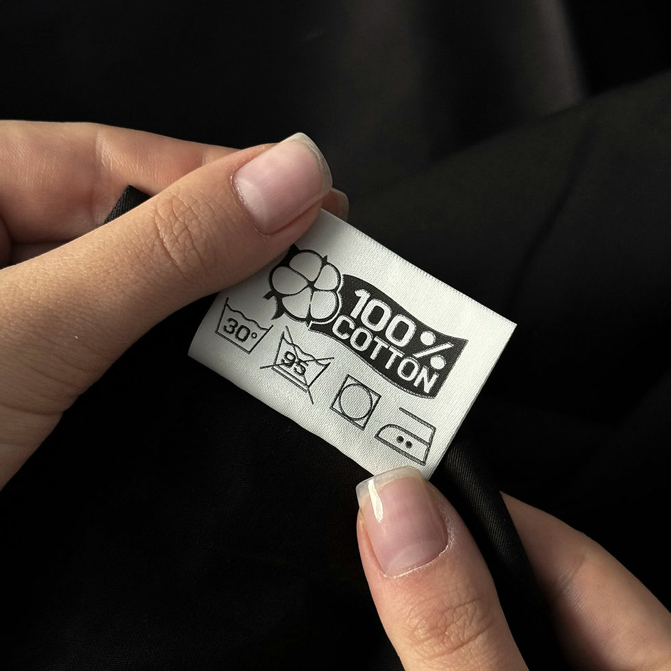 Close up of a clothing label 100 percent cotton